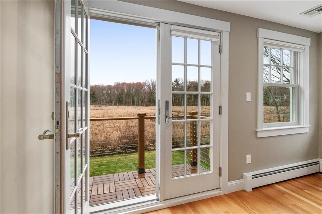 23 Glover Road Needham, MA 02494 - Photo 23 of 40 a view of a room that has a window