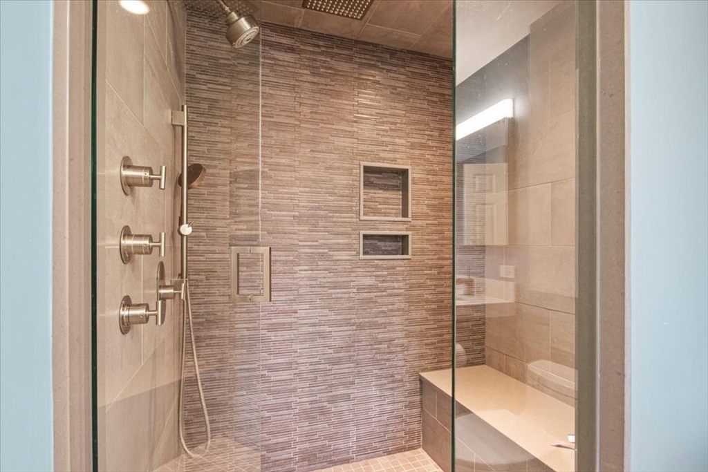 23 Glover Road Needham, MA 02494 - Photo 26 of 40 a bathroom with a shower