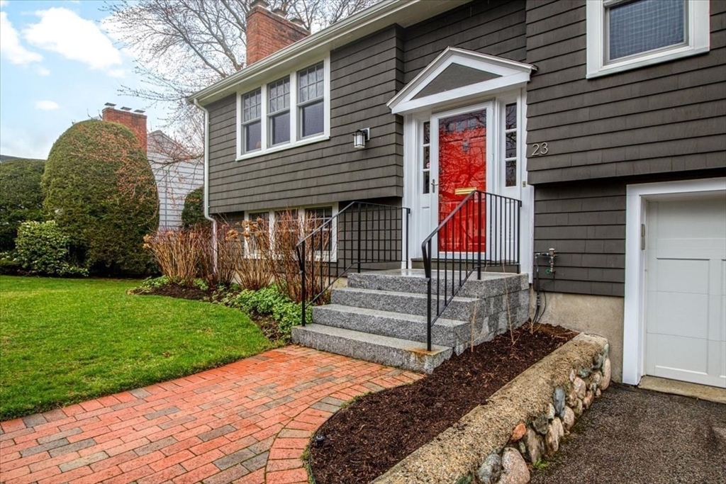 23 Glover Road Needham, MA 02494 - Photo 3 of 40 a front view of a house with garden