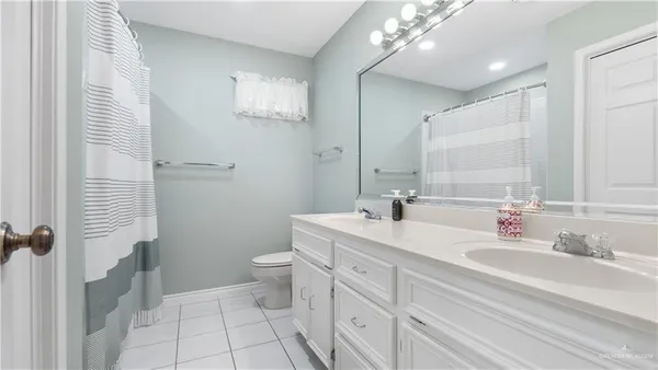 a view of front door with wooden floor