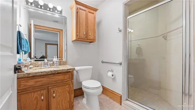 a view of a house with backyard porch and garden