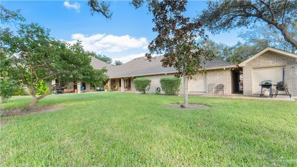 a room with a toilet and a shower curtain