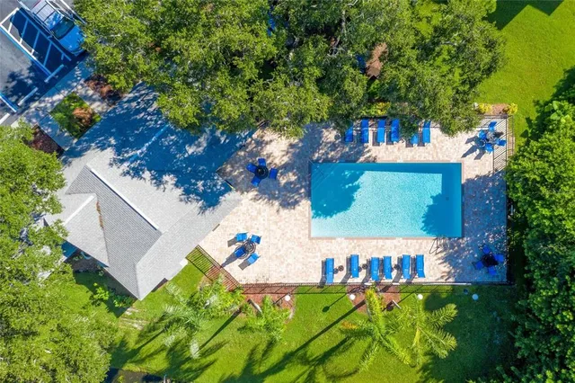 an outdoor space with lots of trees