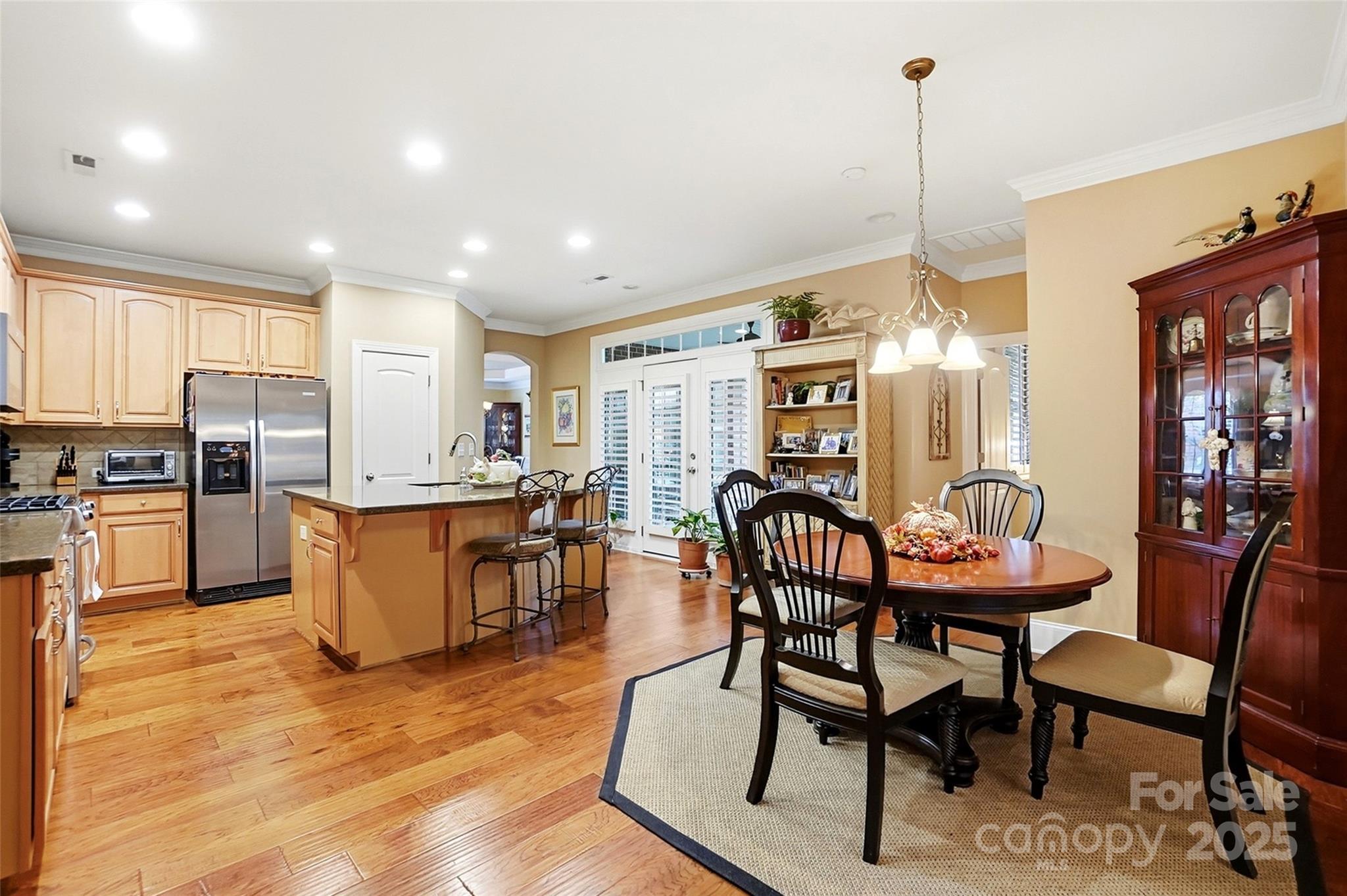 7200 Firespike Road Charlotte, NC 28277 - Photo 12 of 48 a view of a dining room with furniture window and wooden floor