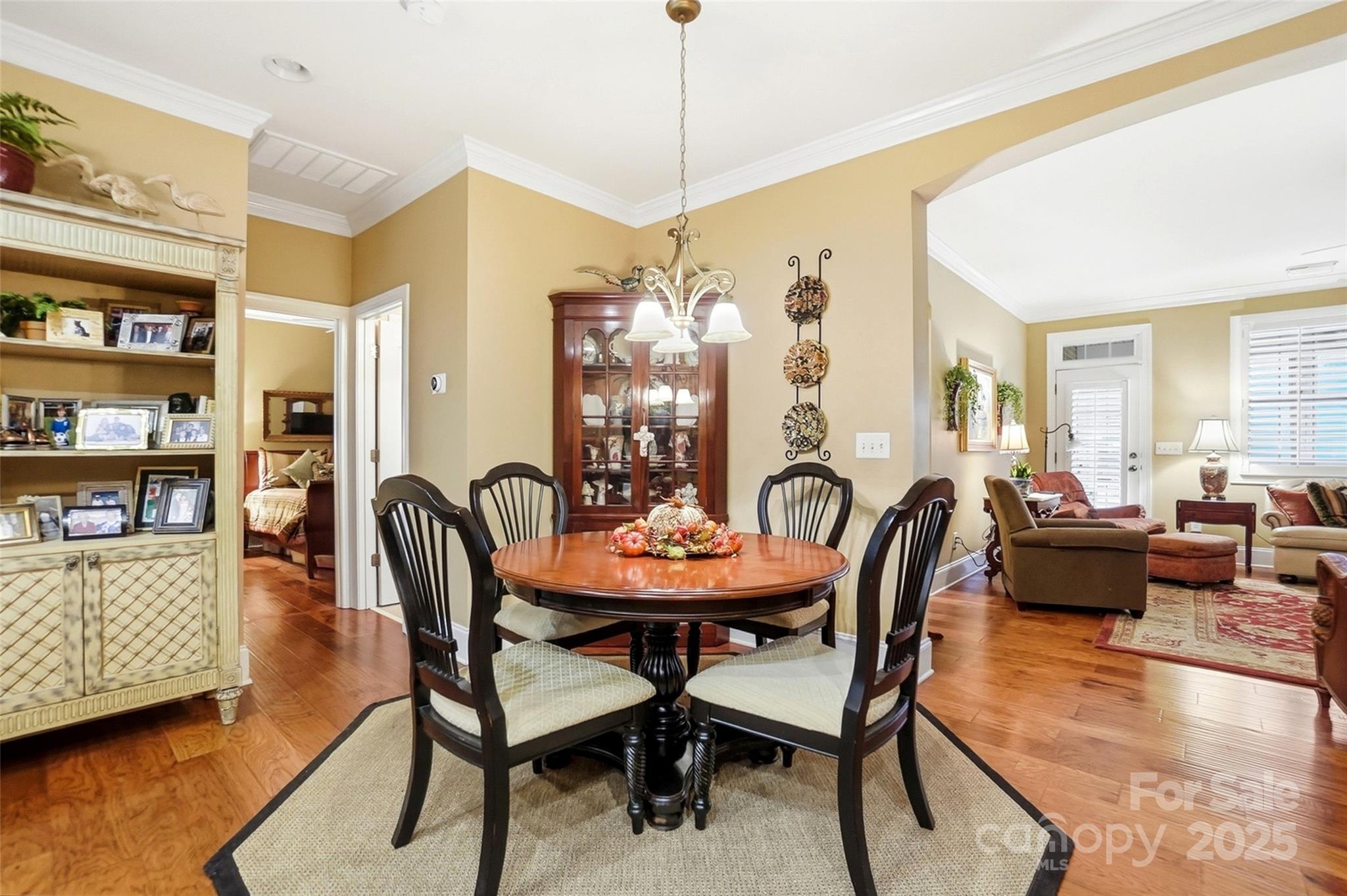 7200 Firespike Road Charlotte, NC 28277 - Photo 17 of 48 a view of a dining room with furniture and wooden floor