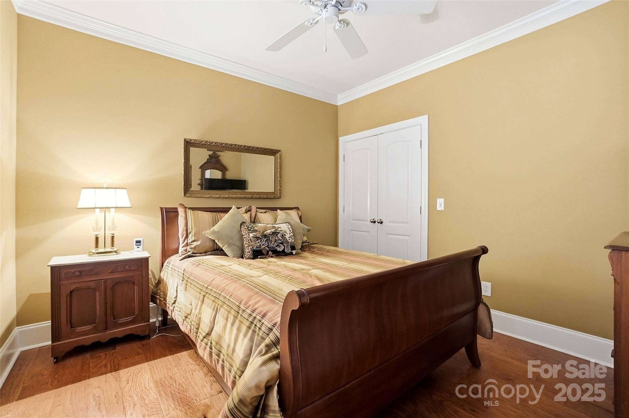 7200 Firespike Road Charlotte, NC 28277 - Photo 29 of 48 a bedroom with a bed and a painting on the wall
