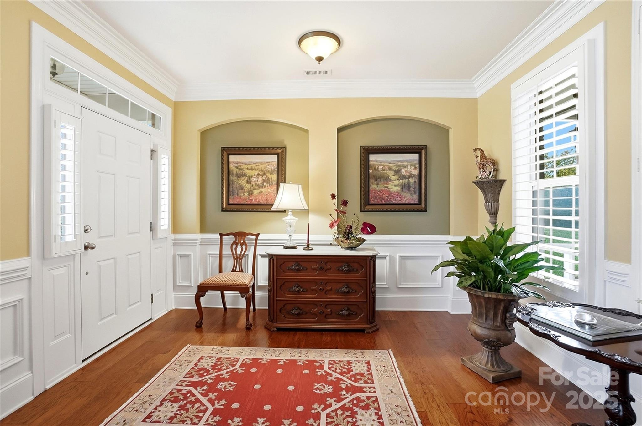 7200 Firespike Road Charlotte, NC 28277 - Photo 3 of 48 a living room with furniture and a potted plant