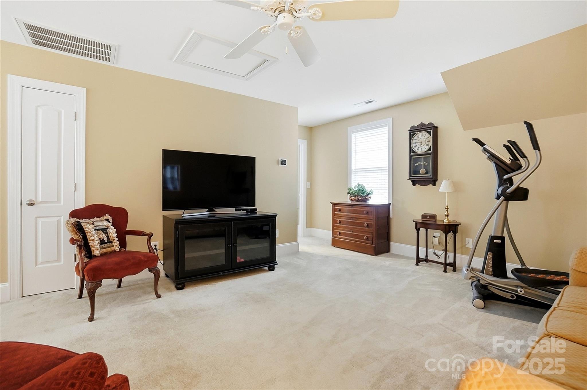 7200 Firespike Road Charlotte, NC 28277 - Photo 38 of 48 a living room with furniture and a flat screen tv