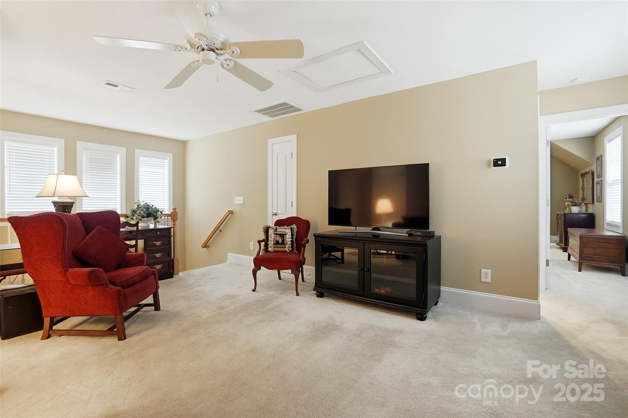 7200 Firespike Road Charlotte, NC 28277 - Photo 39 of 48 a living room with furniture and a flat screen tv
