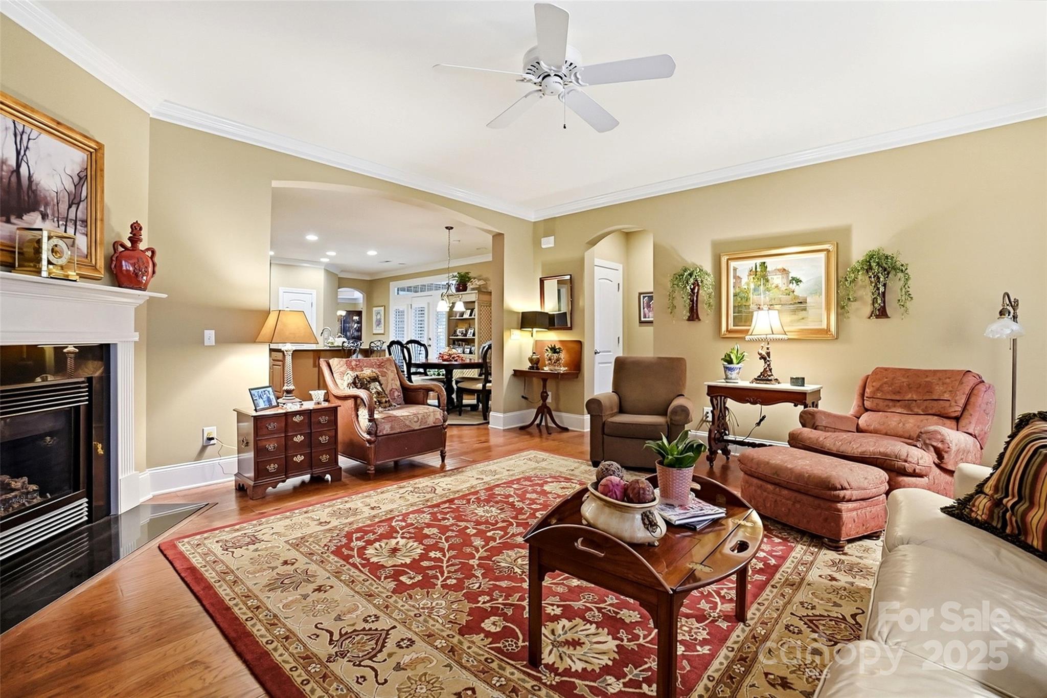 7200 Firespike Road Charlotte, NC 28277 - Photo 10 of 48 a living room with furniture or couch and a fireplace
