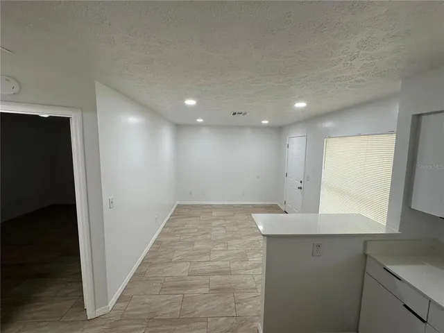 a view of hallway with sink