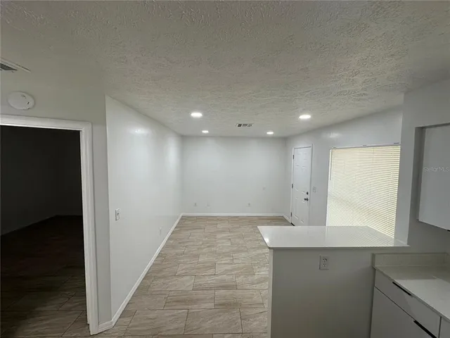 a view of a kitchen with a sink and dishwasher