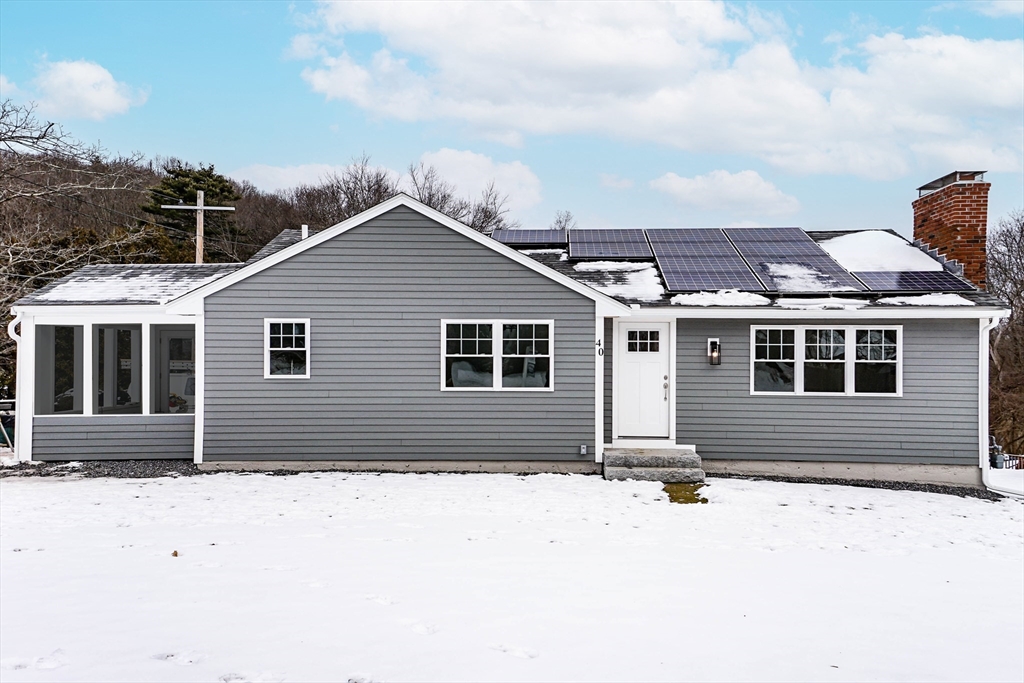 40 Great Road Maynard, MA 01754 - Photo 1 of 30 a front view of a house with a yard
