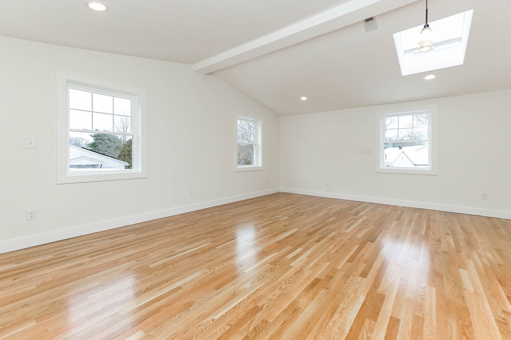 40 Great Road Maynard, MA 01754 - Photo 13 of 30 a view of empty room with wooden floor and fan