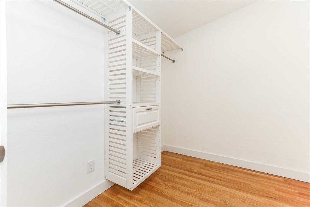 40 Great Road Maynard, MA 01754 - Photo 14 of 30 a view of a room with racks on the wall