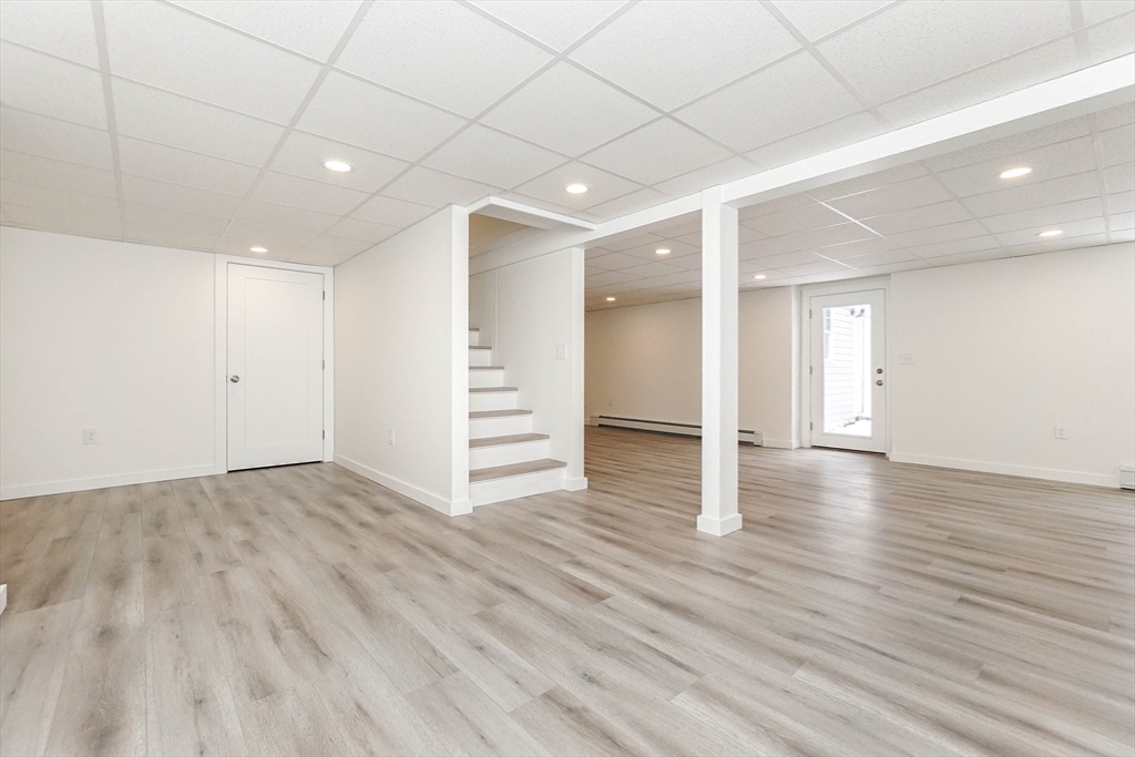 40 Great Road Maynard, MA 01754 - Photo 22 of 30 a view of empty room with wooden floor