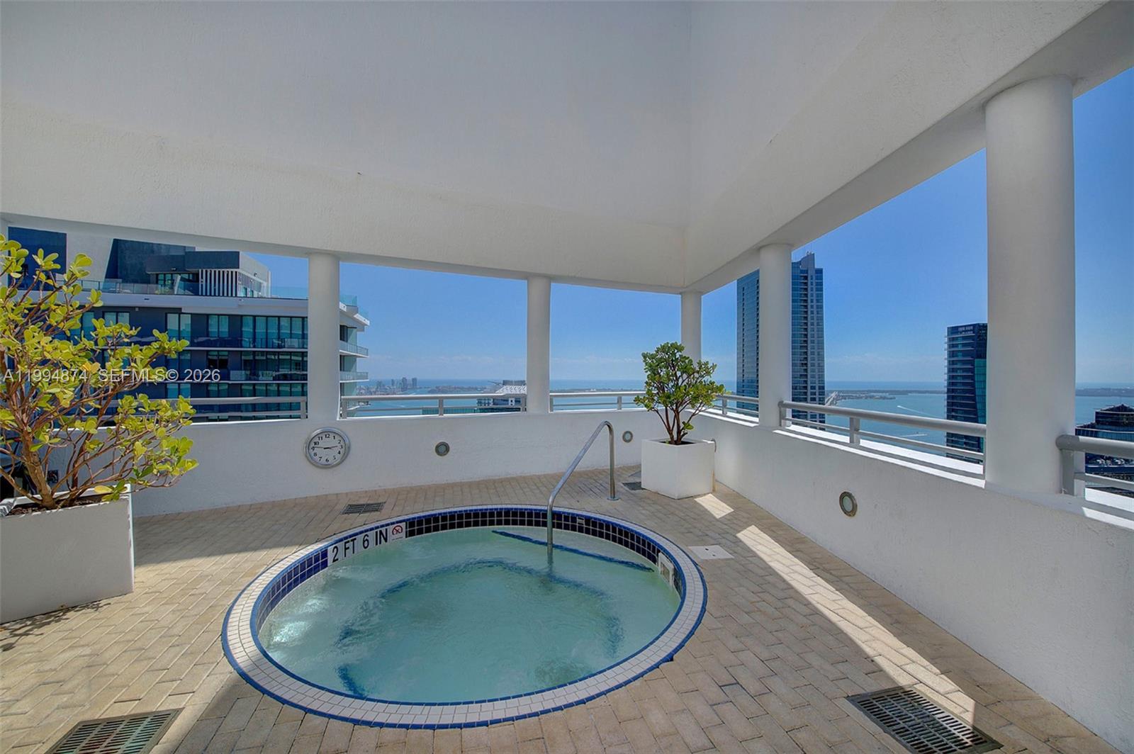 60 Southwest 13th Street, Unit 2820 Miami, FL 33130 - Photo 19 of 25 a room with a sink and potted plant