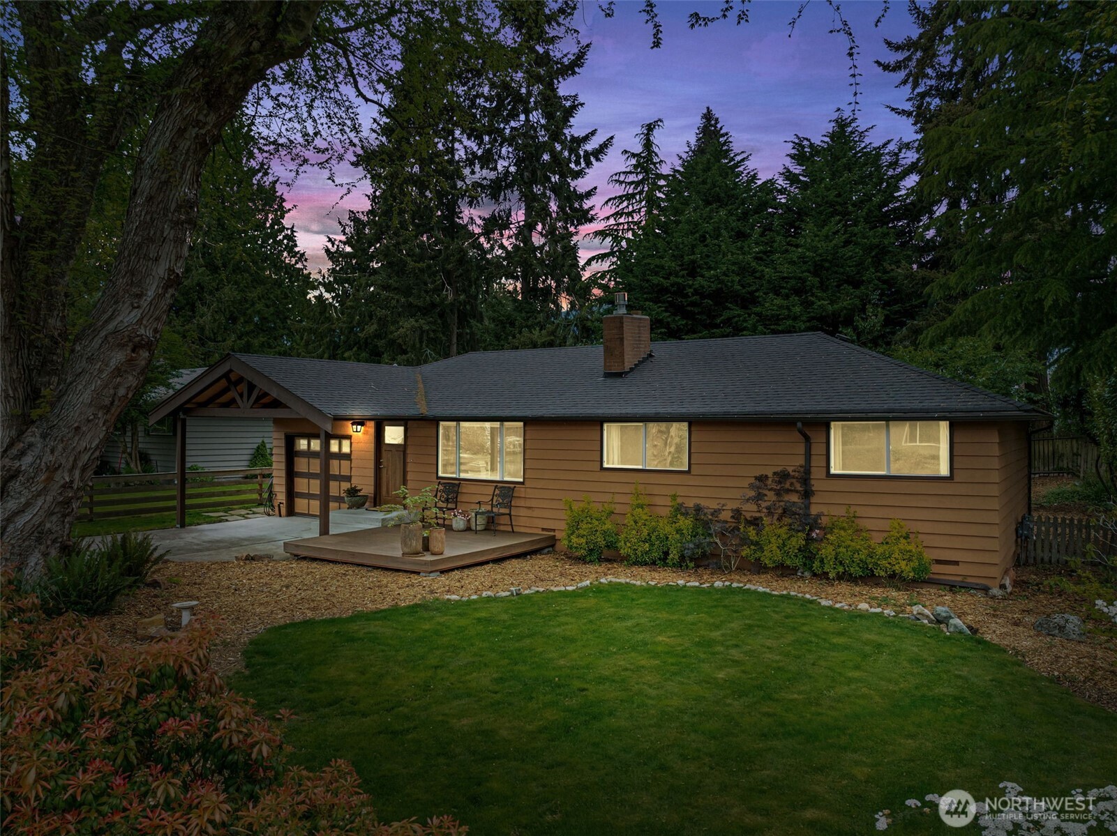 8629 223rd Street Southwest Edmonds, WA 98026 - Photo 39 of 40 a backyard of a house with table and chairs