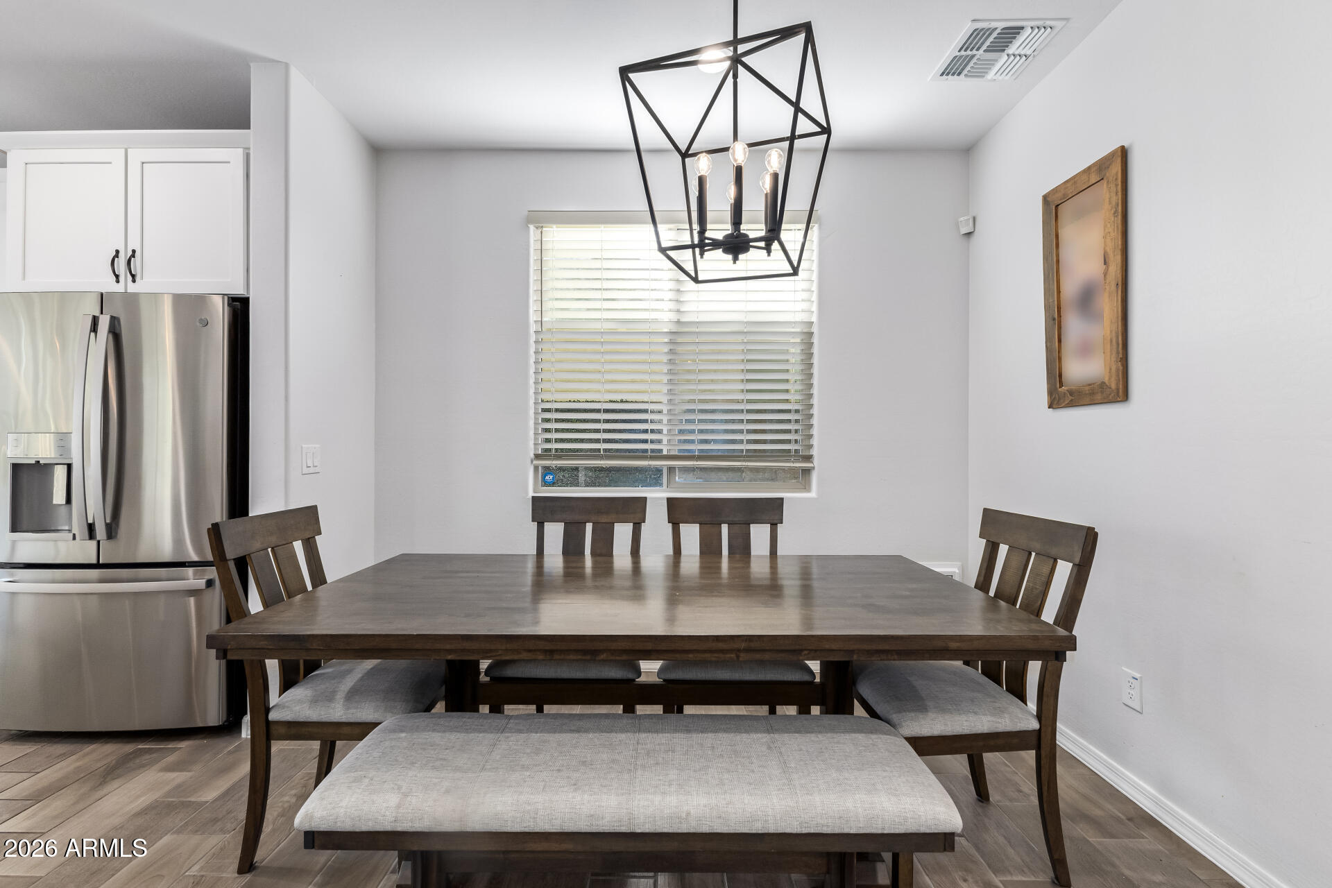 1317 East Fremont Road Phoenix, AZ 85042 - Photo 13 of 41 a view of a dining room with furniture