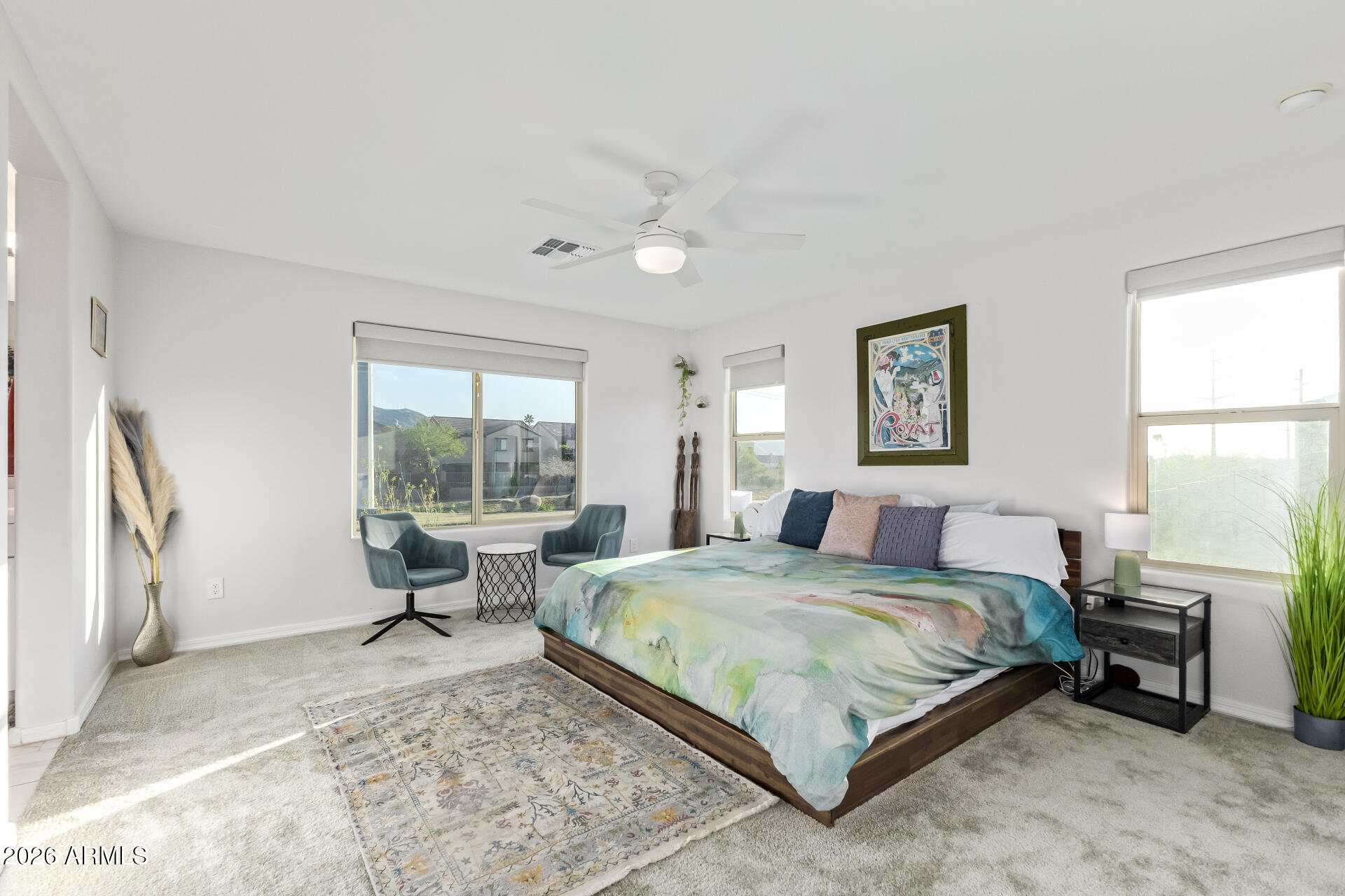 1317 East Fremont Road Phoenix, AZ 85042 - Photo 22 of 41 a bedroom with a bed and a window