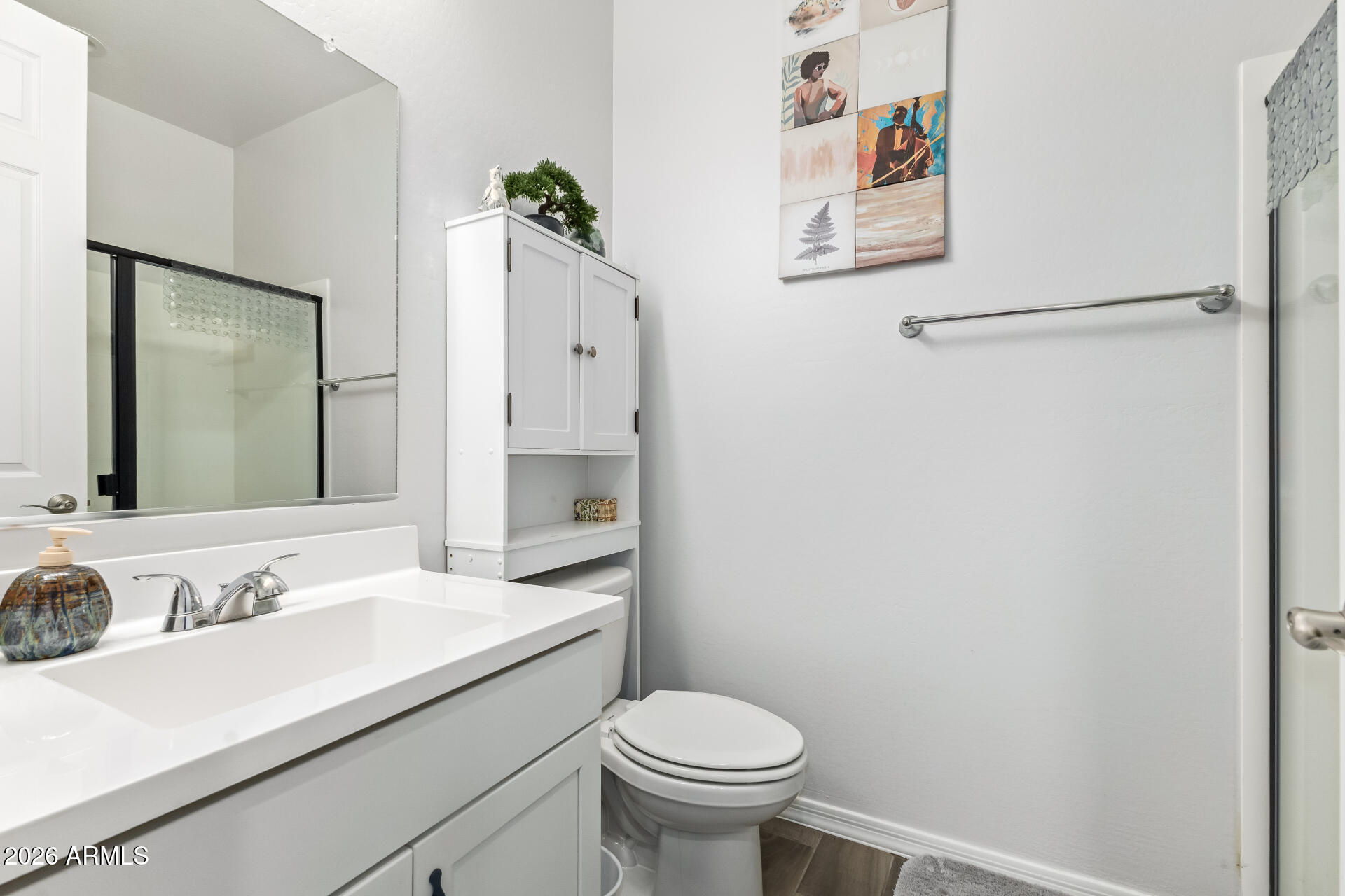1317 East Fremont Road Phoenix, AZ 85042 - Photo 29 of 41 a bathroom with a sink toilet and vanity