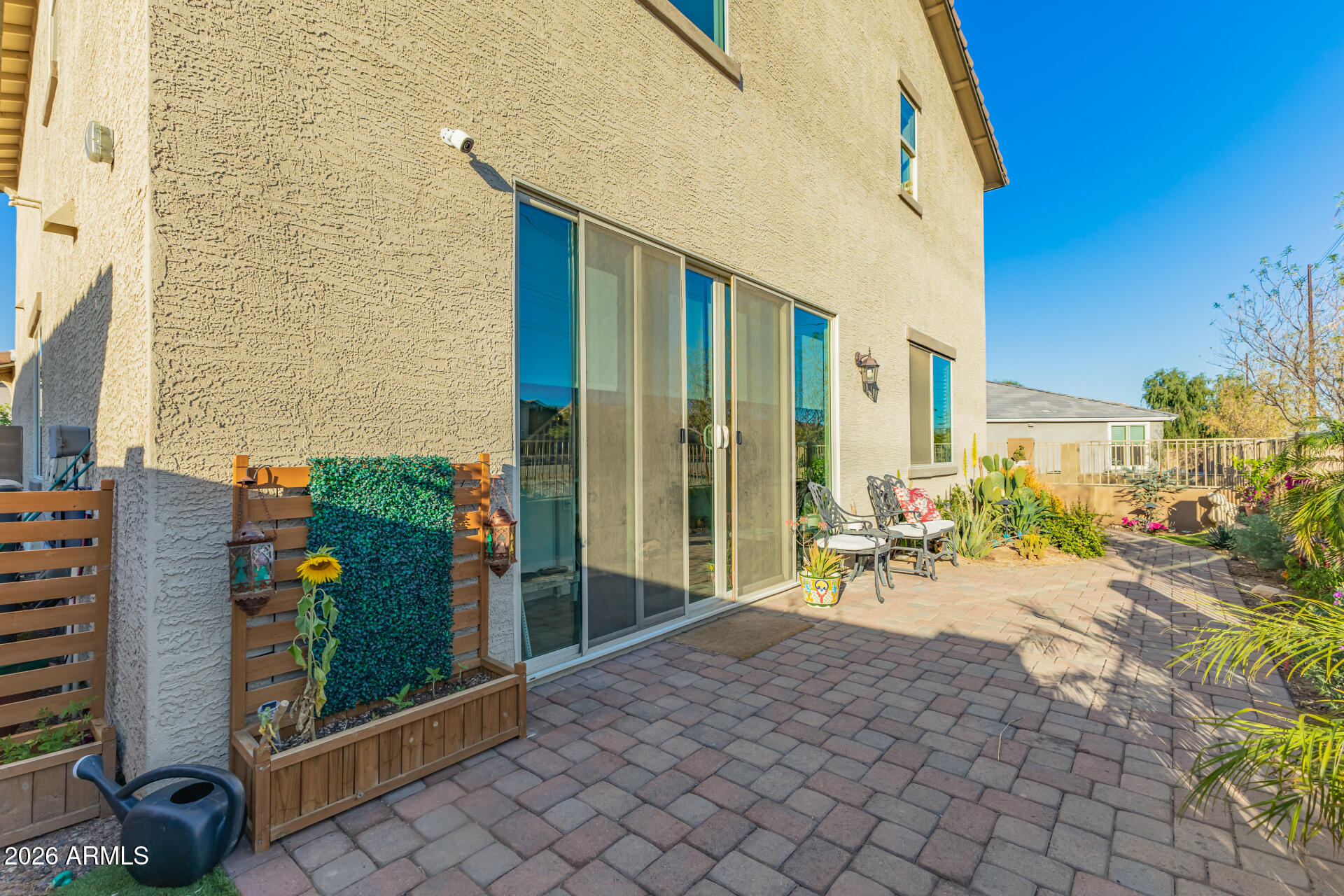 1317 East Fremont Road Phoenix, AZ 85042 - Photo 39 of 41 a view of a porch with chairs and tables