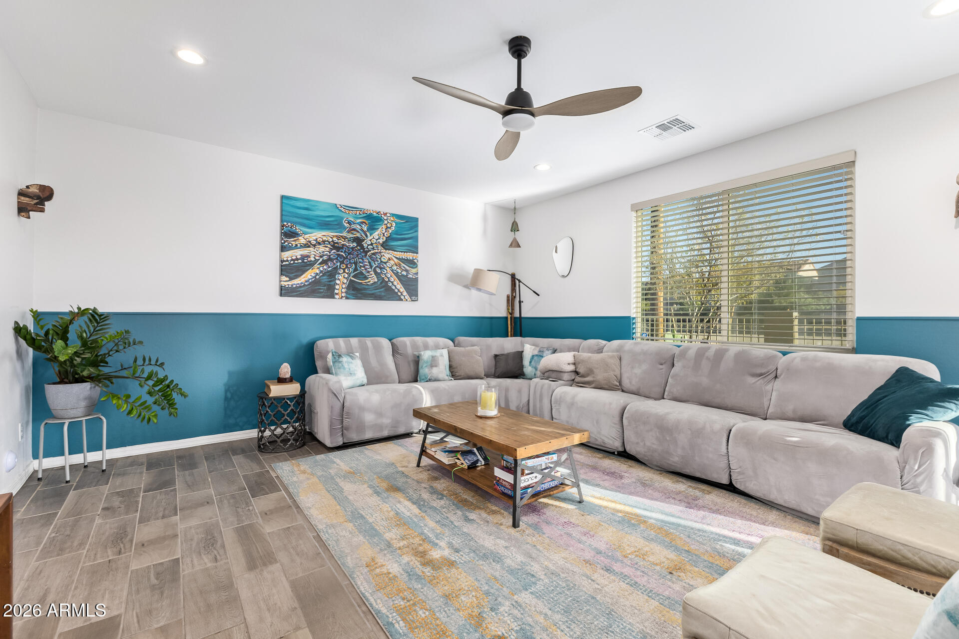 1317 East Fremont Road Phoenix, AZ 85042 - Photo 7 of 41 a living room with furniture and a large window
