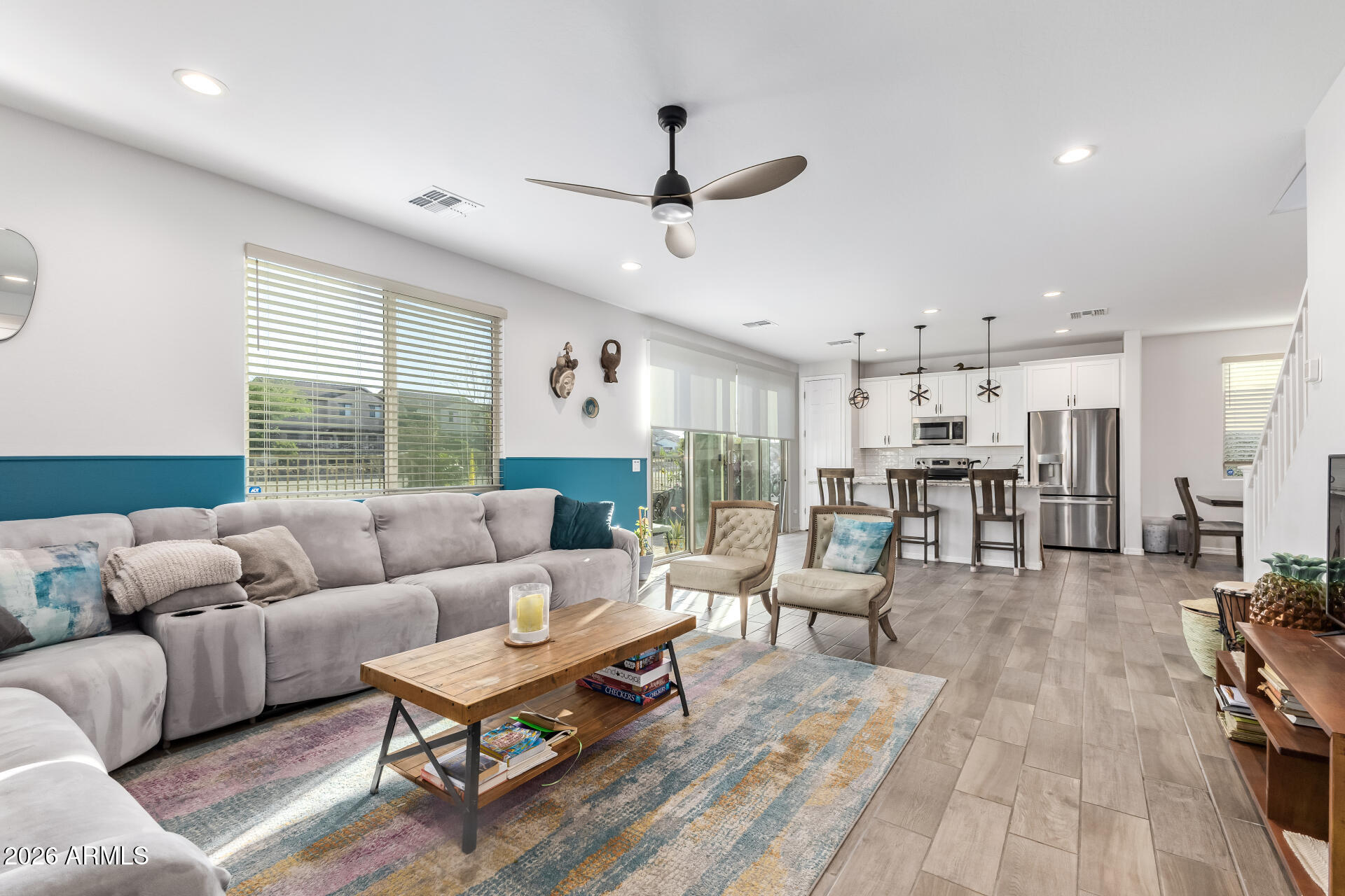 1317 East Fremont Road Phoenix, AZ 85042 - Photo 9 of 41 a living room with furniture and a large window