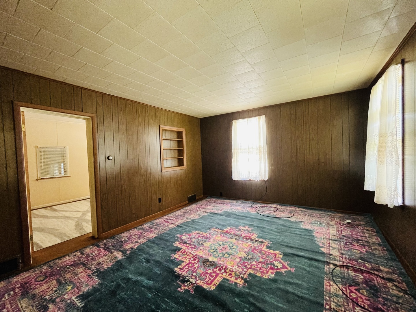 1213 East Main Street Streator, IL 61364 - Photo 5 of 18 a bedroom with a bed and a window