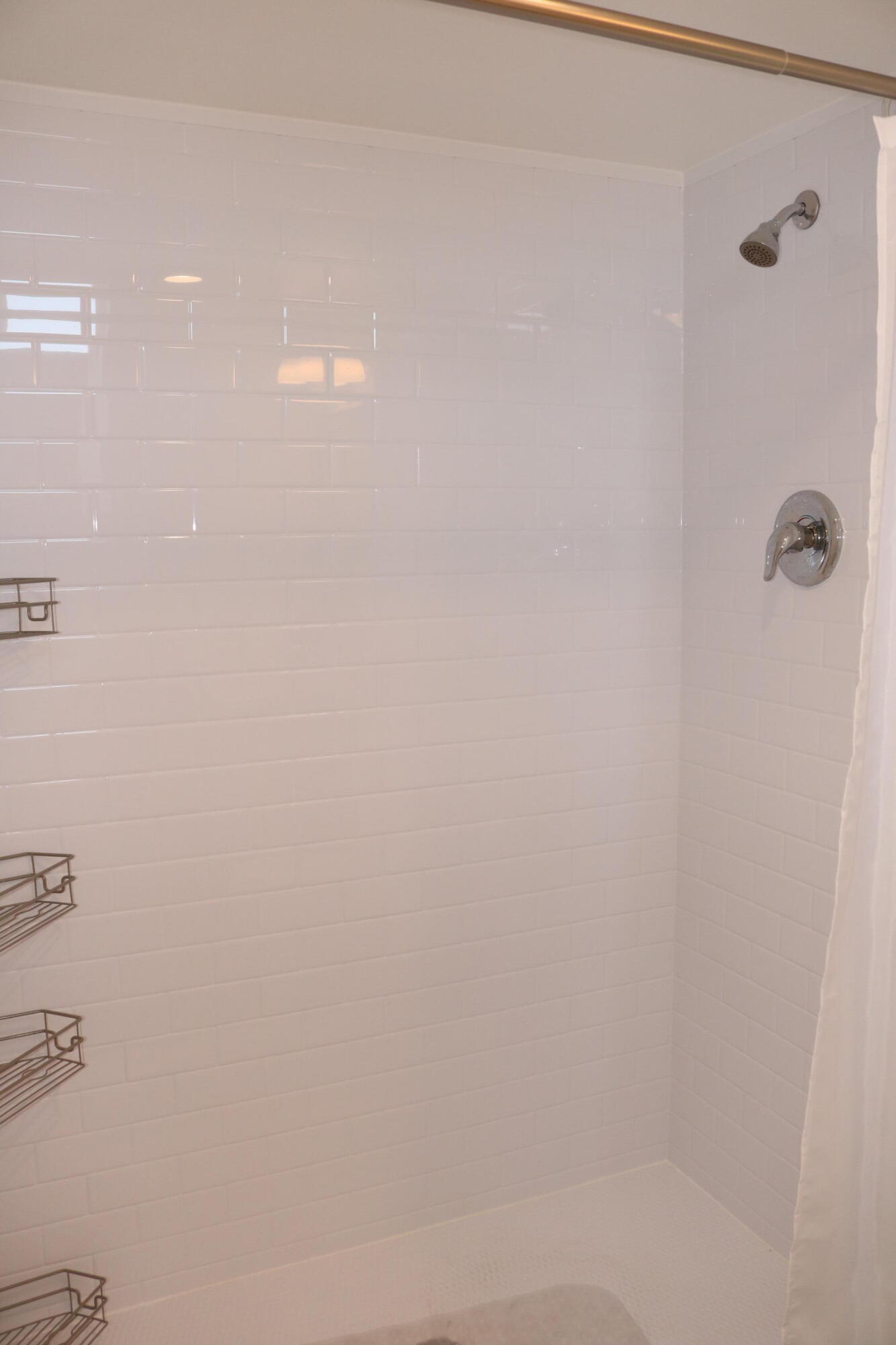 6461 Northwest 2nd Avenue, Unit 508 Boca Raton, FL 33487 - Photo 23 of 39 a bathroom with a shower