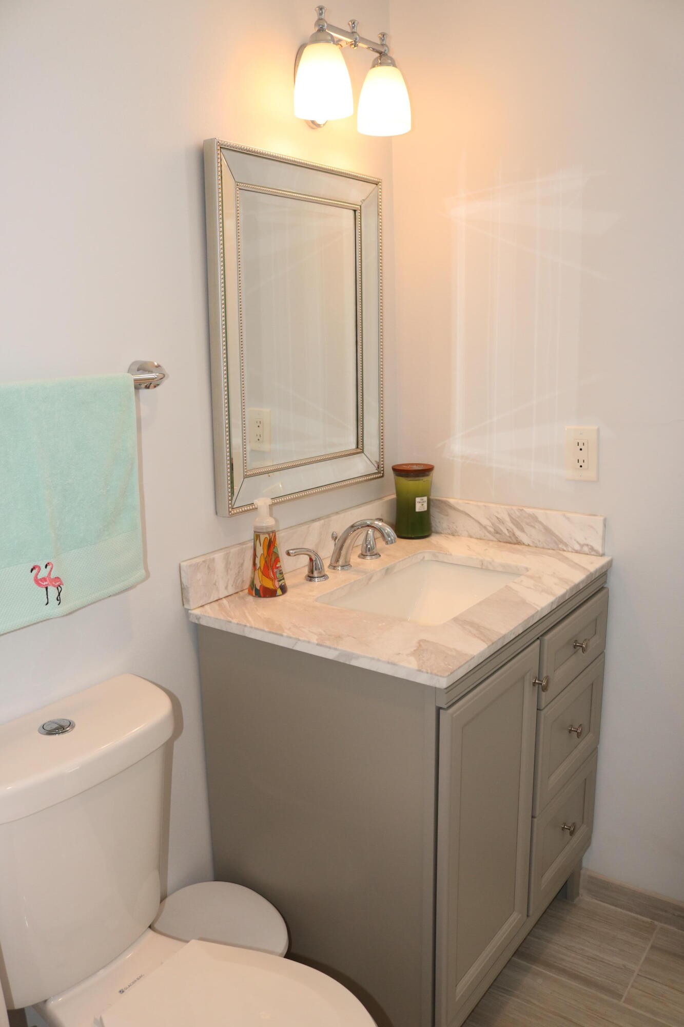 6461 Northwest 2nd Avenue, Unit 508 Boca Raton, FL 33487 - Photo 24 of 39 a bathroom with a sink and a mirror