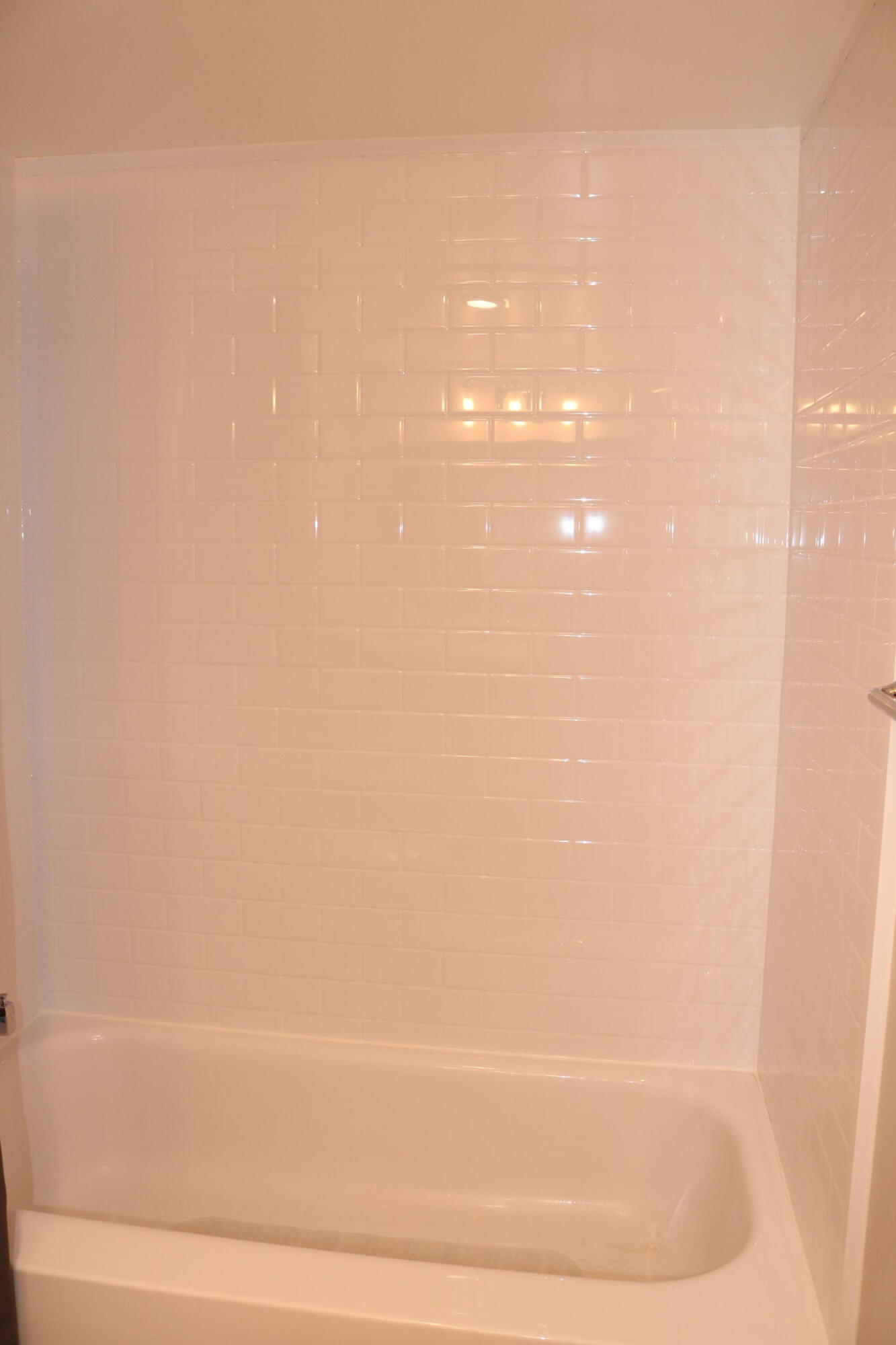 6461 Northwest 2nd Avenue, Unit 508 Boca Raton, FL 33487 - Photo 32 of 39 a bathroom with a bathtub