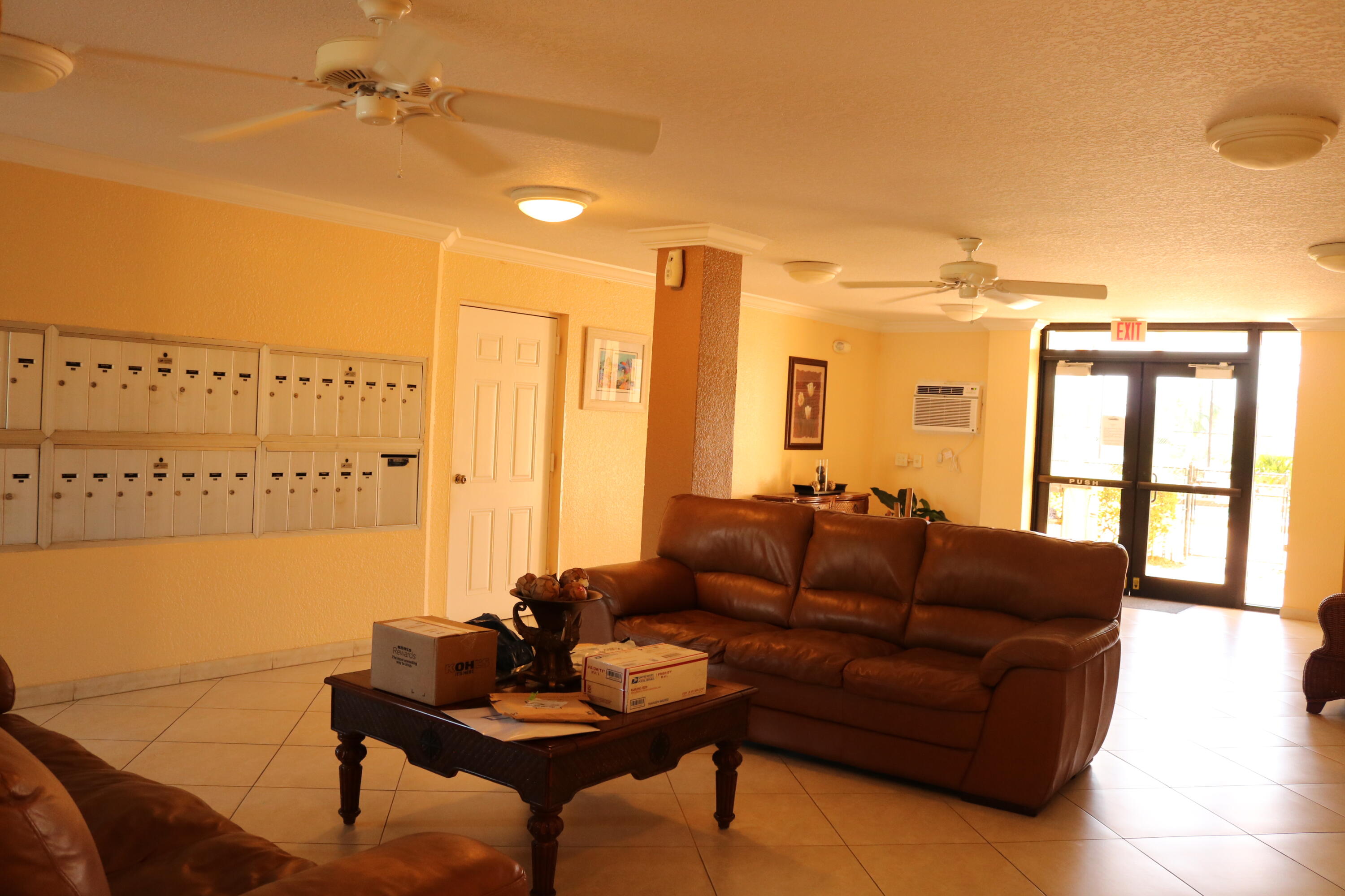 6461 Northwest 2nd Avenue, Unit 508 Boca Raton, FL 33487 - Photo 36 of 39 a living room with furniture and a large window