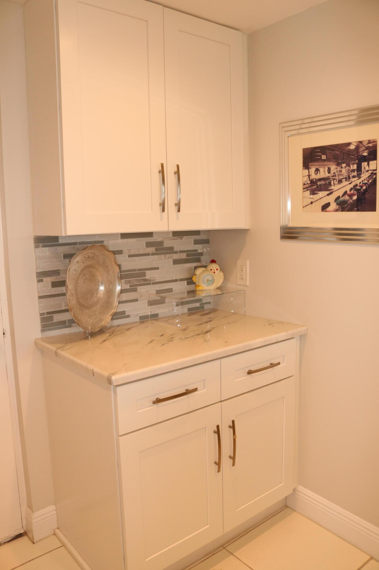 6461 Northwest 2nd Avenue, Unit 508 Boca Raton, FL 33487 - Photo 9 of 39 a bathroom with a sink and a mirror