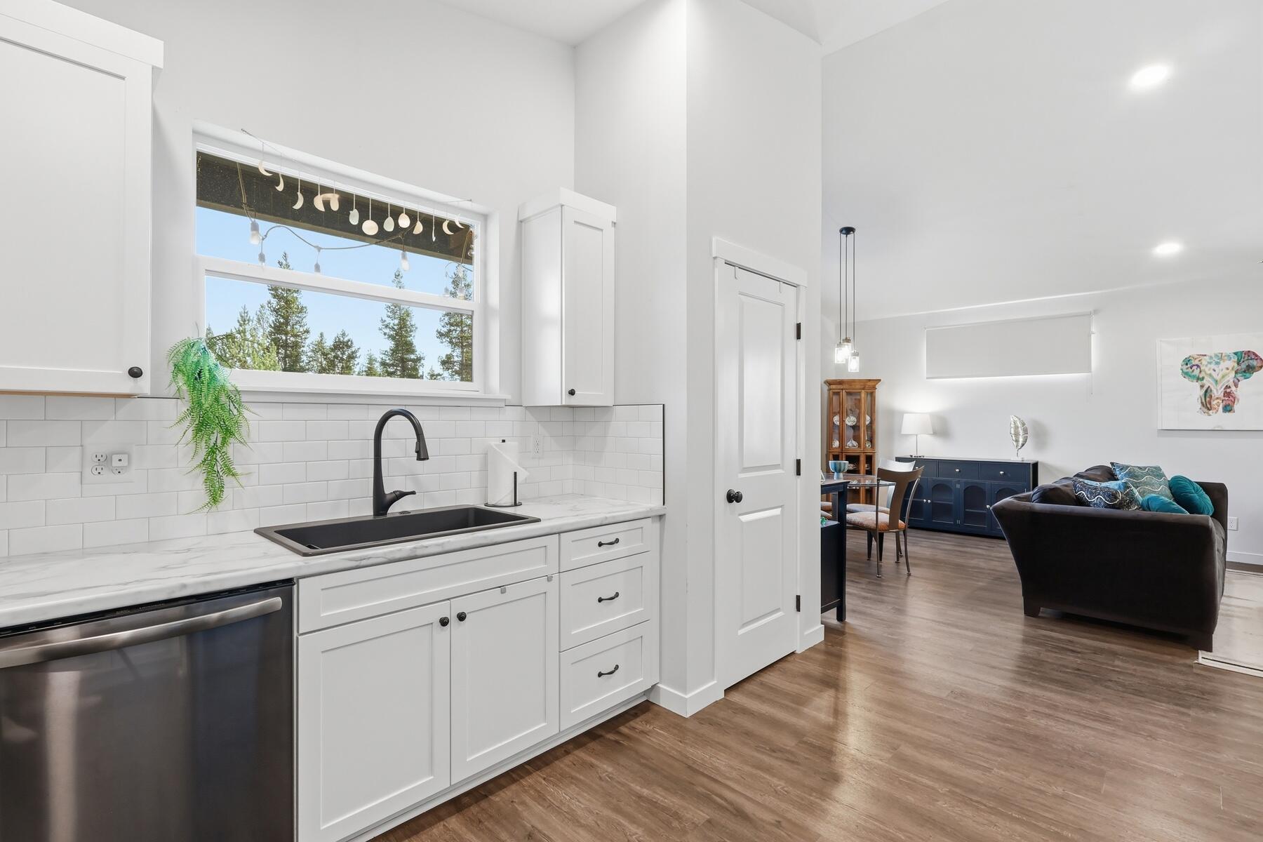 16455 Bassett Road La Pine, OR 97739 - Photo 12 of 44 a kitchen with a sink stove and cabinets