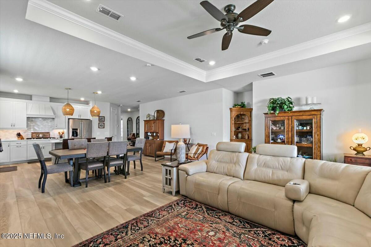 22 Myrtle Oak Court St. Augustine, FL 32092 - Photo 14 of 36 a living room with furniture kitchen view and a large window
