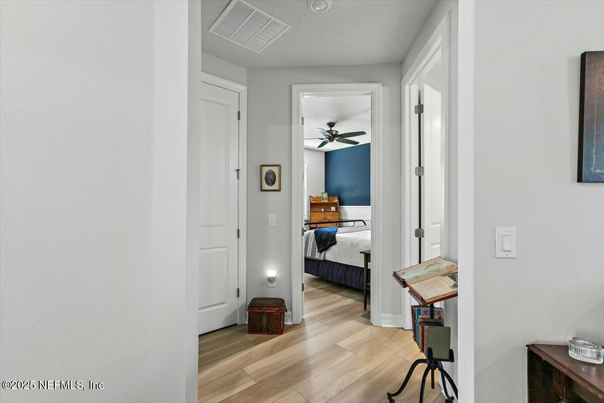 22 Myrtle Oak Court St. Augustine, FL 32092 - Photo 19 of 36 a view of living room with furniture and wooden floor