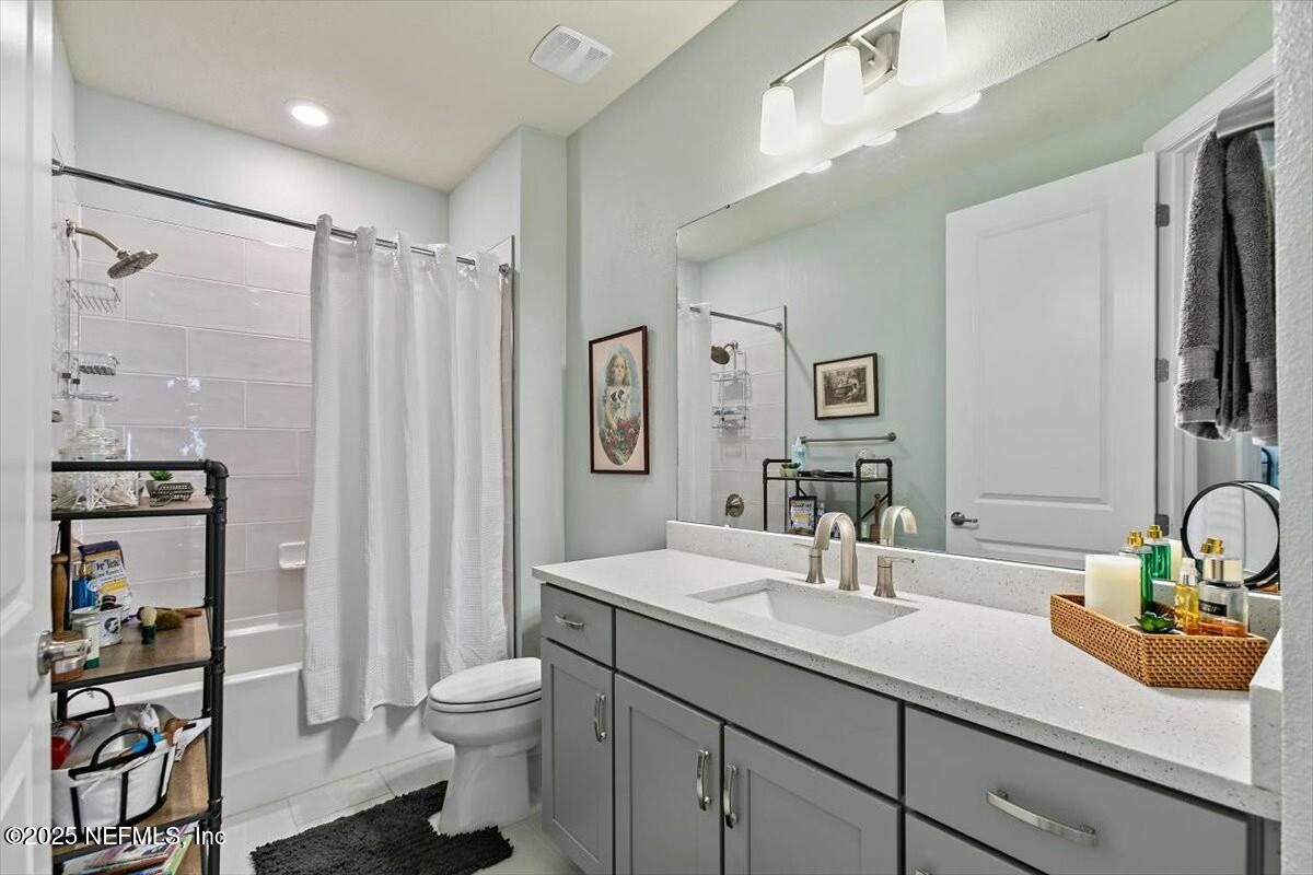 22 Myrtle Oak Court St. Augustine, FL 32092 - Photo 21 of 36 a bathroom with a sink toilet and shower