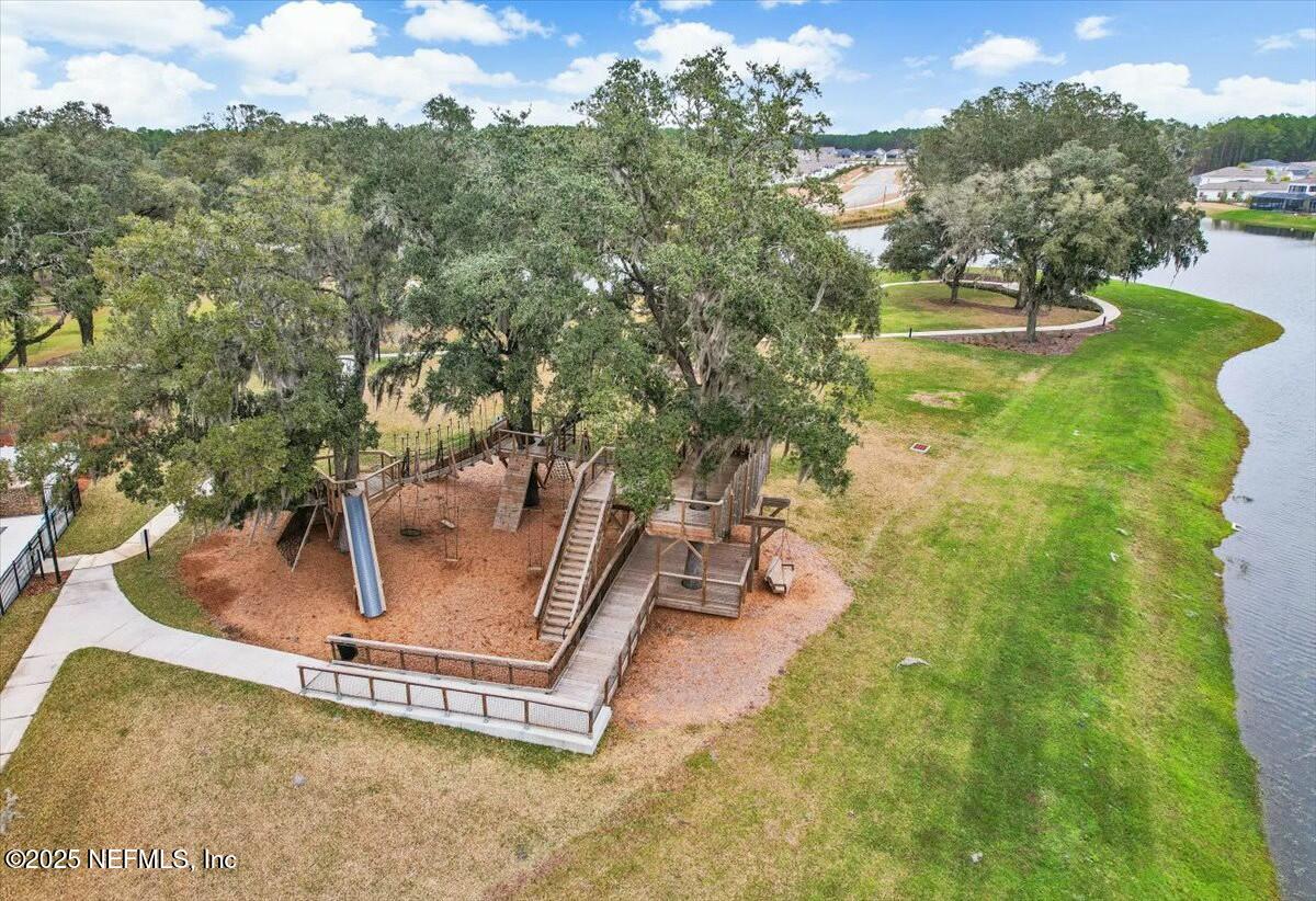 22 Myrtle Oak Court St. Augustine, FL 32092 - Photo 34 of 36 a view of a swimming pool with a yard