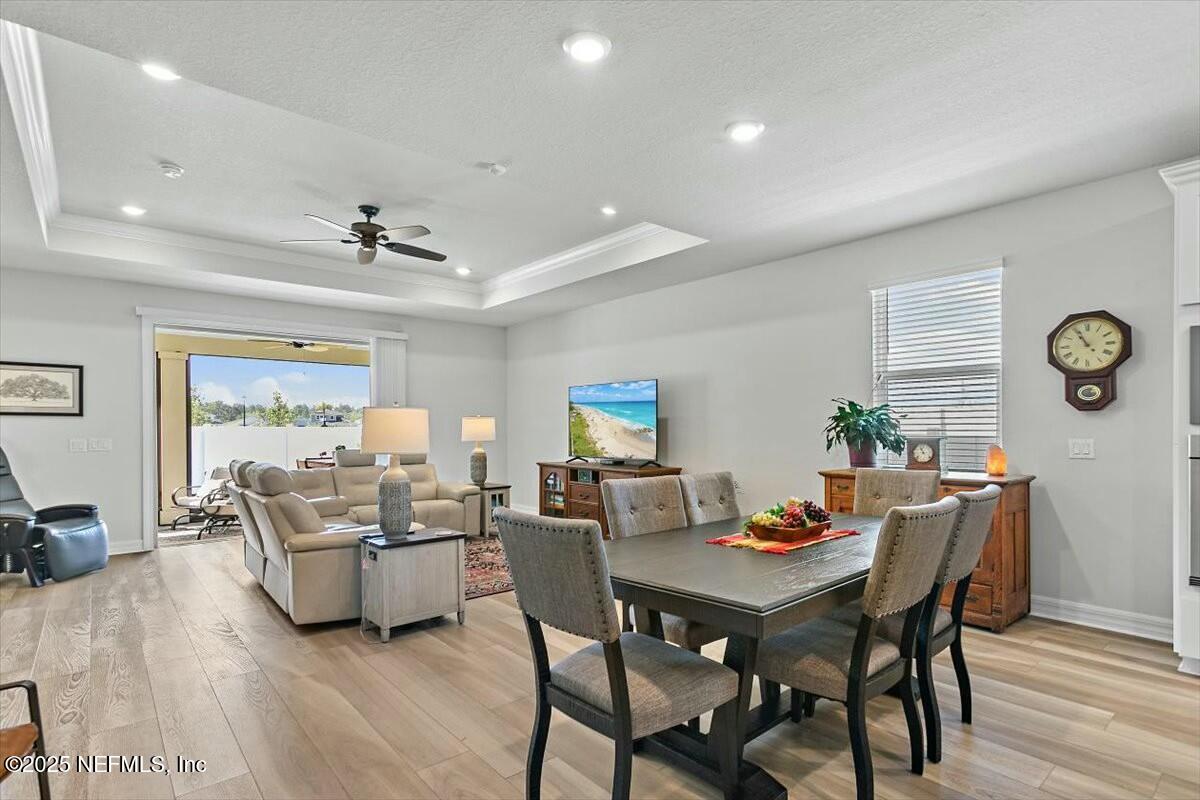 22 Myrtle Oak Court St. Augustine, FL 32092 - Photo 6 of 36 a living room with furniture and wooden floor