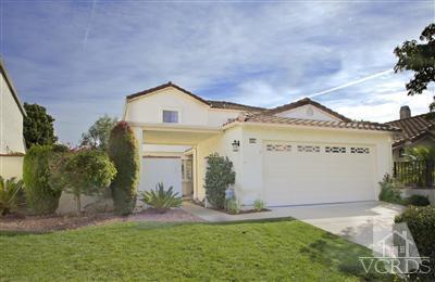 880 Congressional Road Simi Valley, CA 93065 - Photo 1 of 19 a front view of a house with a yard and garage