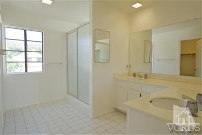 880 Congressional Road Simi Valley, CA 93065 - Photo 13 of 19 a bathroom with a sink and a mirror