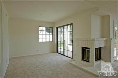 880 Congressional Road Simi Valley, CA 93065 - Photo 5 of 19 an empty room with fireplace