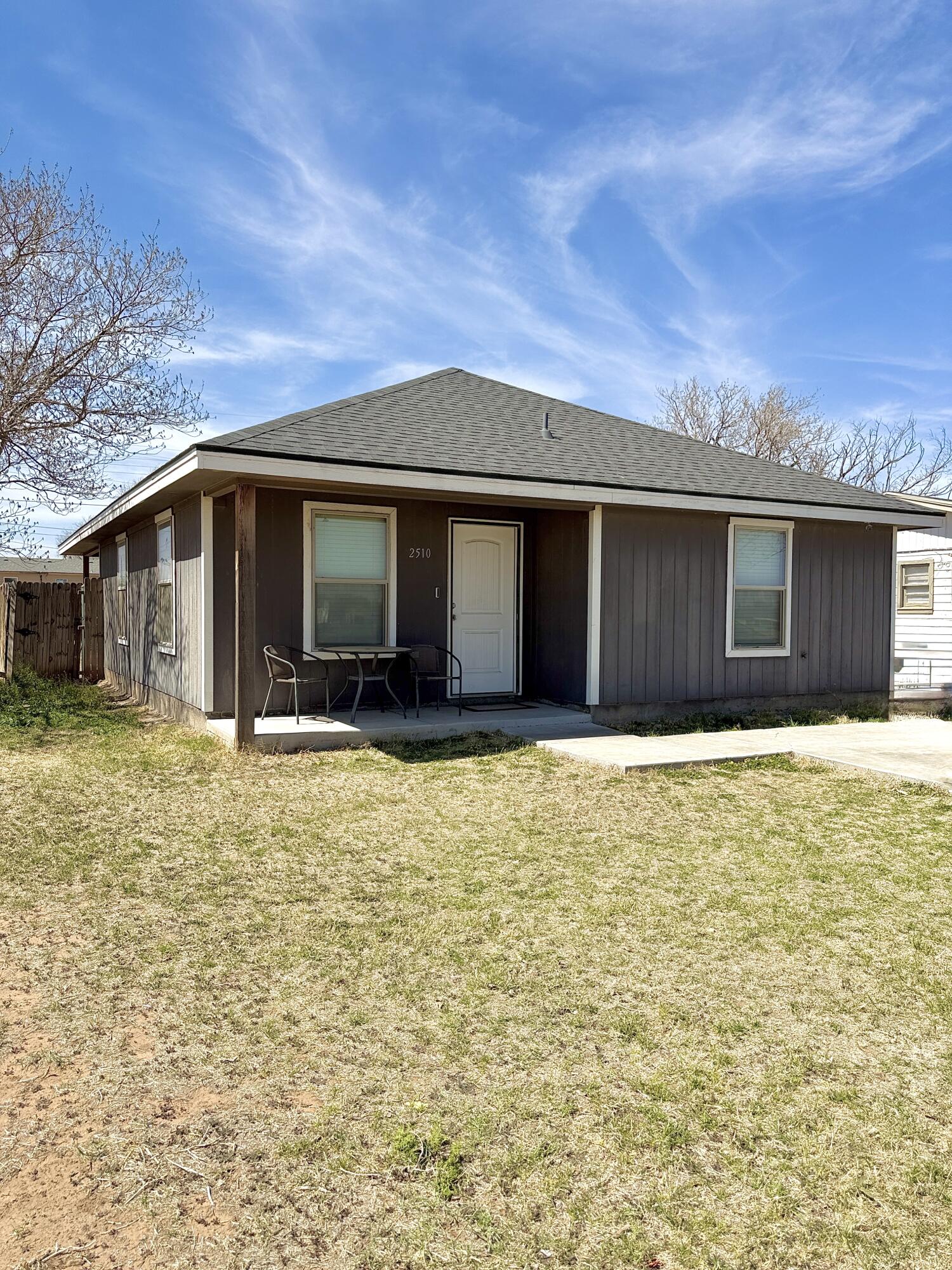 2510 Date Avenue Lubbock, TX 79404 - Photo 1 of 2 a front view of a house with a yard