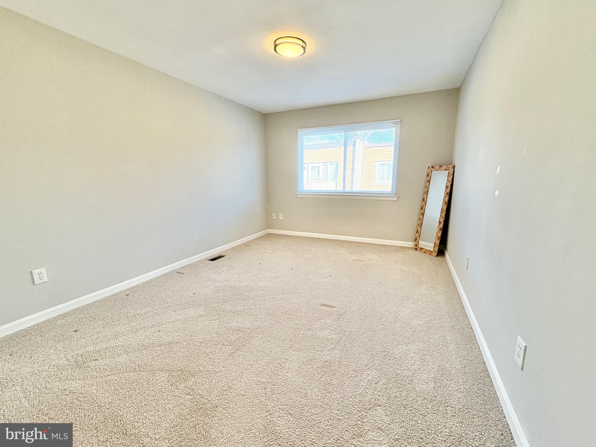 3813 Segundo Place, Unit D Alexandria, VA 22309 - Photo 16 of 28 an empty room with windows