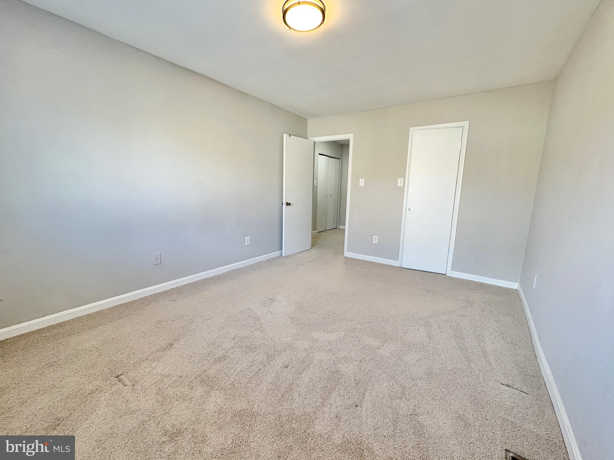 3813 Segundo Place, Unit D Alexandria, VA 22309 - Photo 17 of 28 a view of an empty room and window