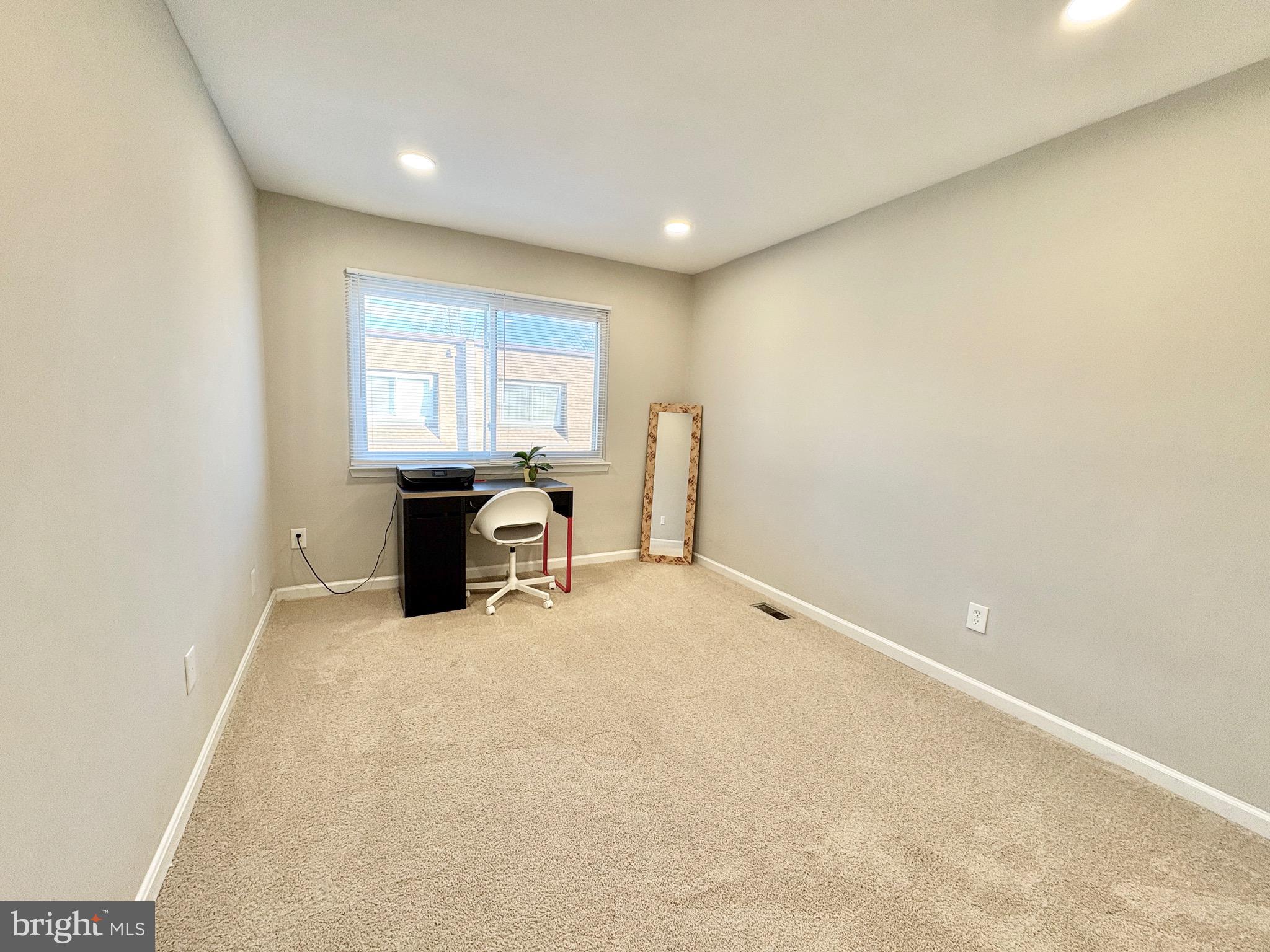 3813 Segundo Place, Unit D Alexandria, VA 22309 - Photo 20 of 28 an empty room with furniture and window
