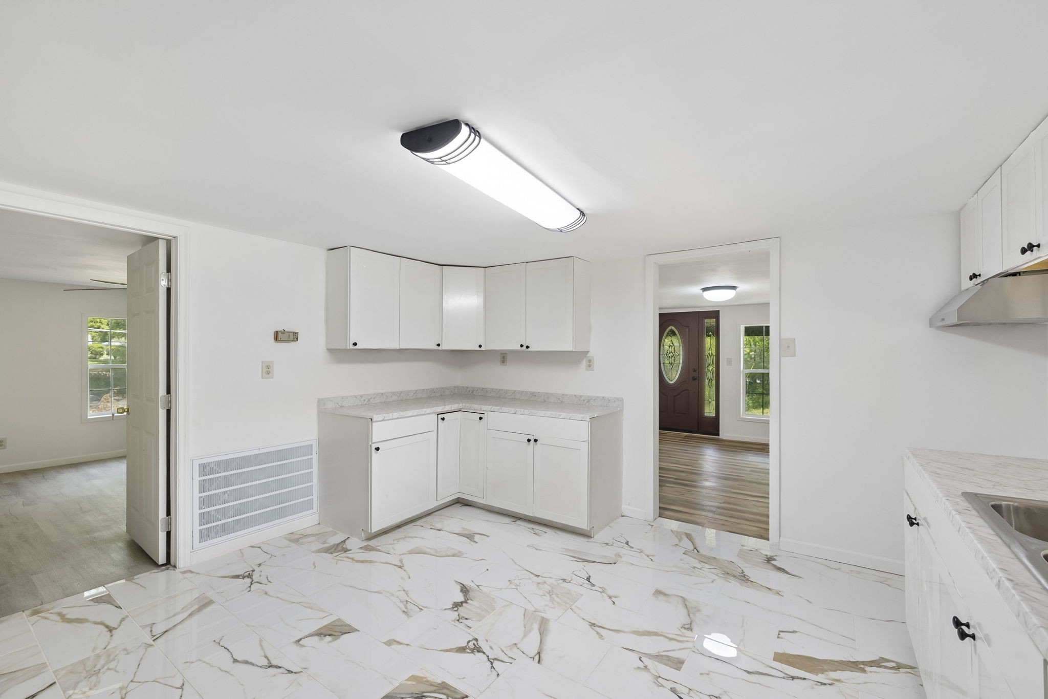 1200 Little Street Winchester, TN 37398 - Photo 21 of 54 a room with white cabinets and sink