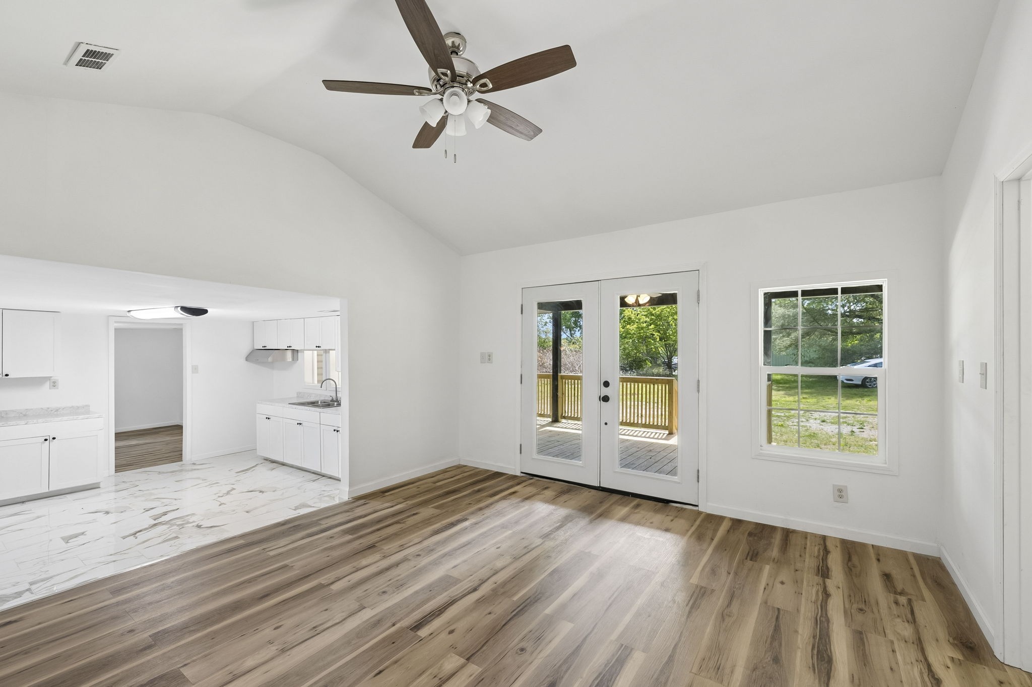 1200 Little Street Winchester, TN 37398 - Photo 29 of 54 a view of an empty room with a window and wooden floor