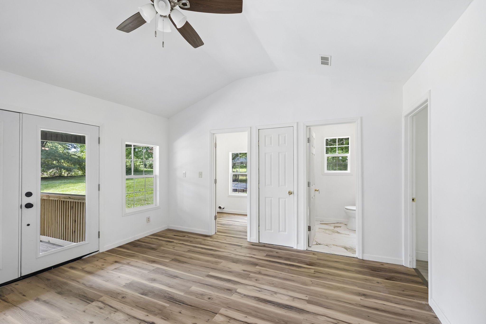 1200 Little Street Winchester, TN 37398 - Photo 30 of 54 a view of an empty room with wooden floor and a window